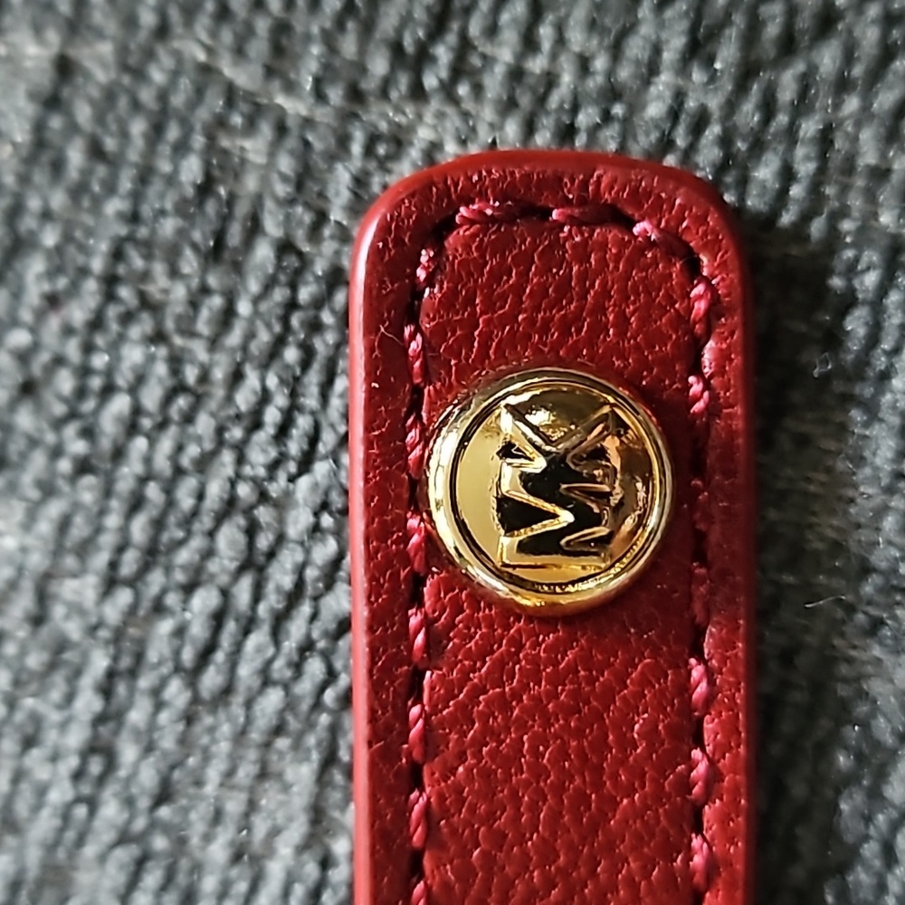 MICHAEL KORS STUDDED MONOGRAMMED LEATHER BRACELET